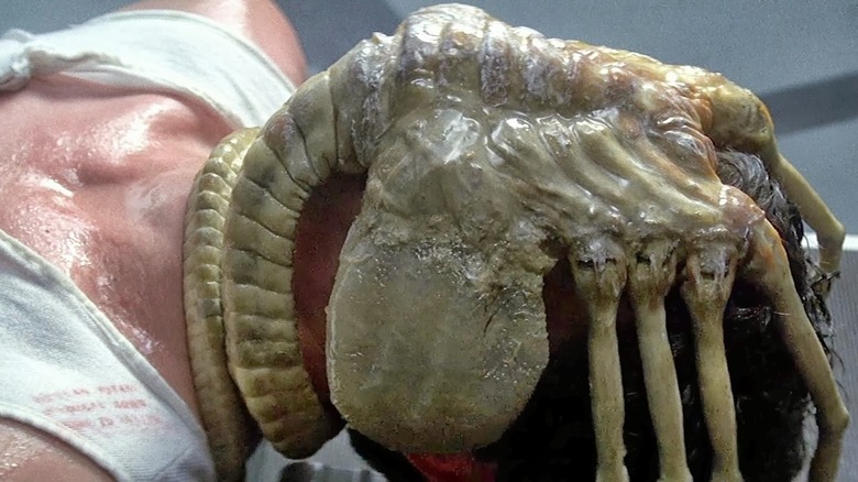 Facehugger wrapped around Kane's head