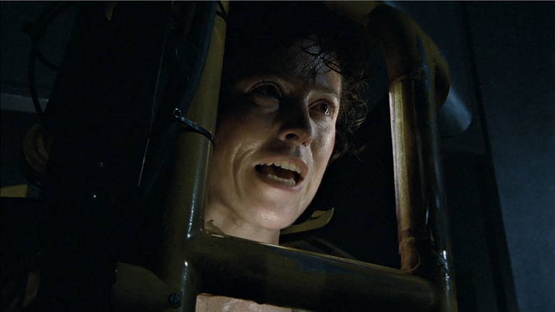 Ripley looks determined in a robotic power loader