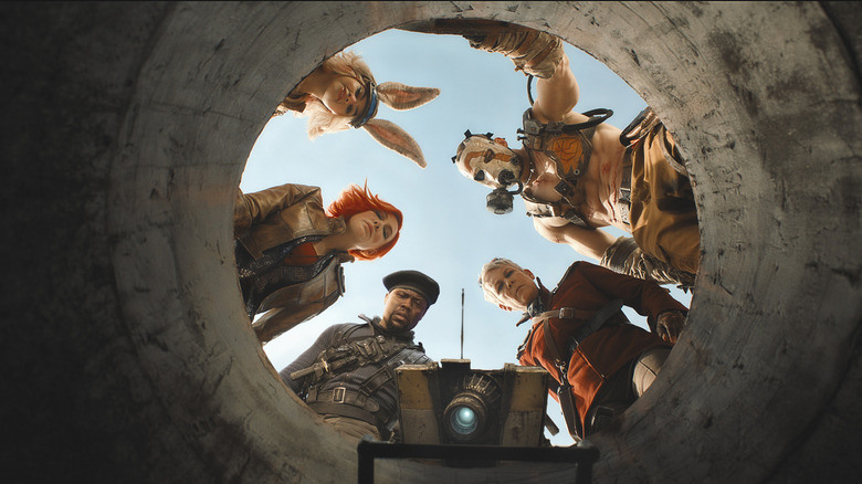 Borderlands team looking down hole