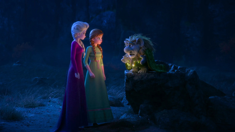 Grand Pabbie talking to Anna and Elsa