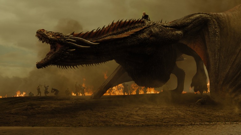 Daenerys riding Drogon in battle