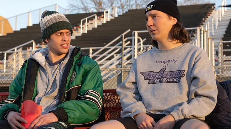 Keith and Kevin sit at track seats