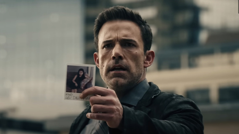 Danny Rourke holding daughter's photo