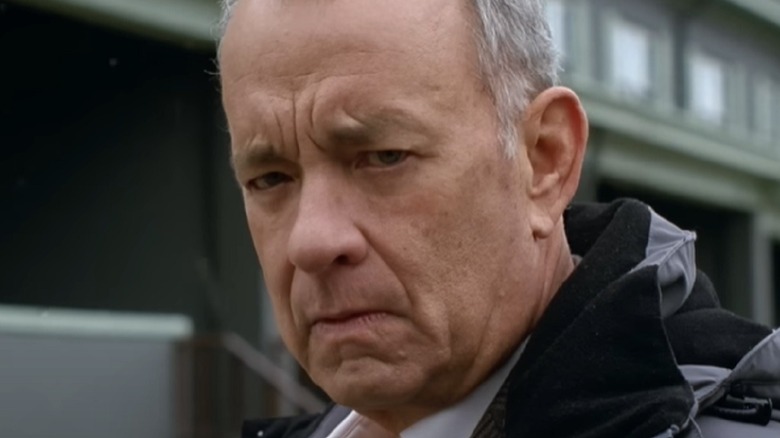 Tom Hanks scowls