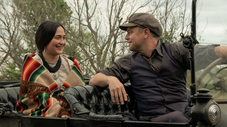 Ernest and Mollie smiling in car