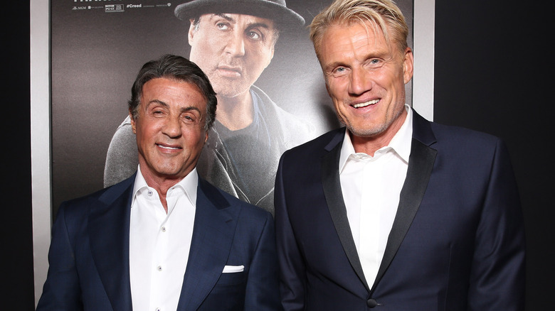 Sylvester Stallone and Dolph Lundgren smiling