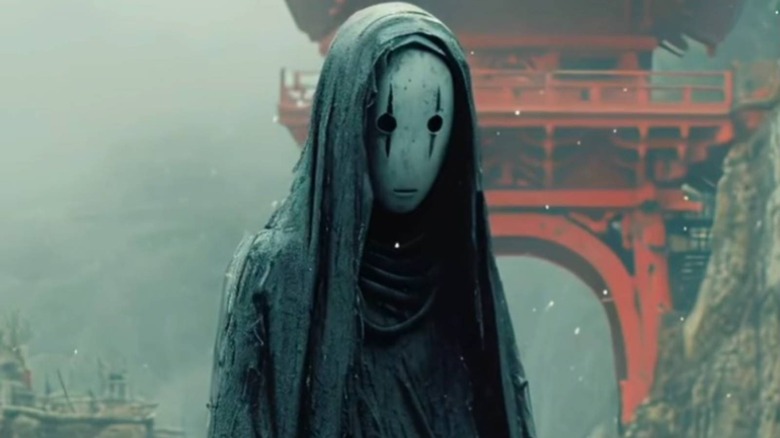 No-Face in front of red structure