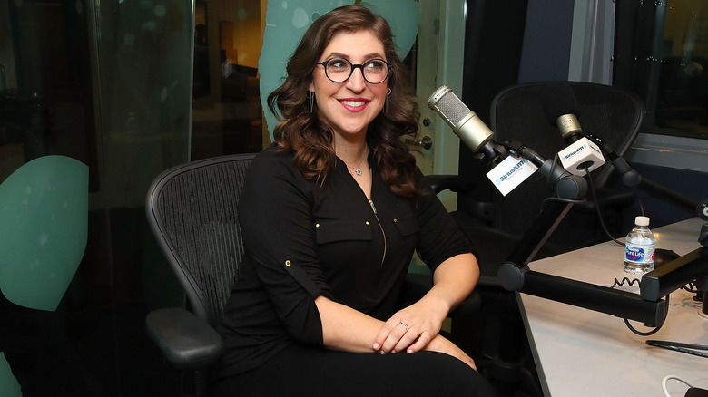 Mayim Bialik smiling during podcast