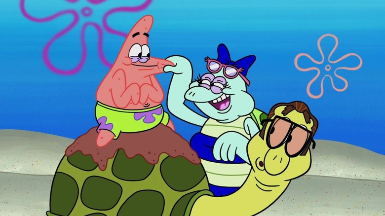 Patrick on top of a turtle