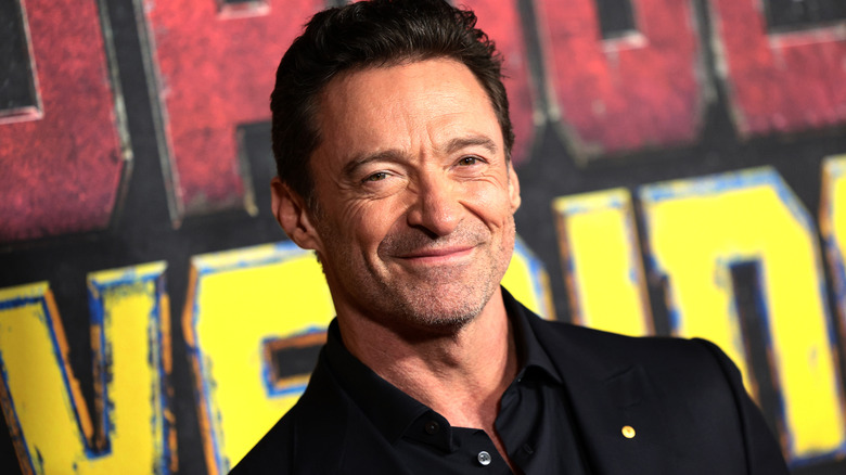 Hugh Jackman smiles at premiere