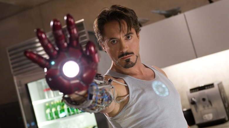 Tony Stark with iron man hand