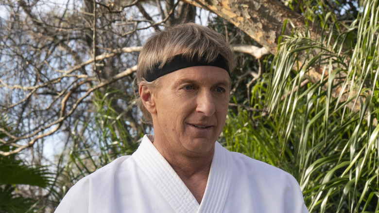 Johnny Lawrence wearing headband