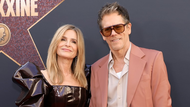 Kyra Sedgwick smiling with Kevin Bacon