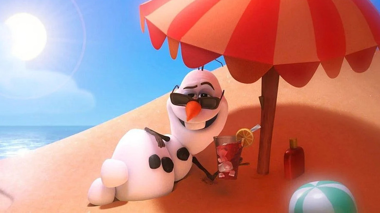 Olaf drinking on beach with sunglasses